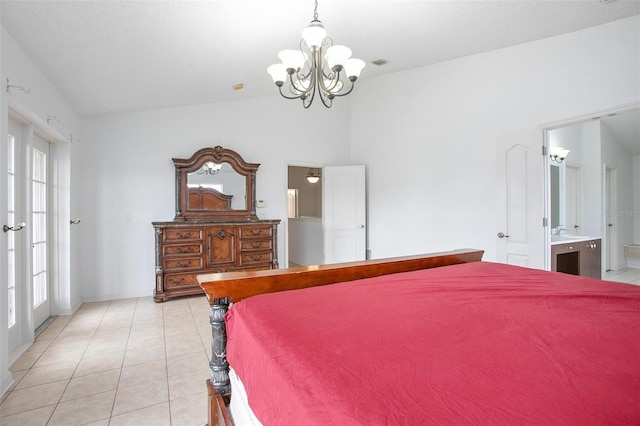 tiled bedroom with french doors and ensuite bath