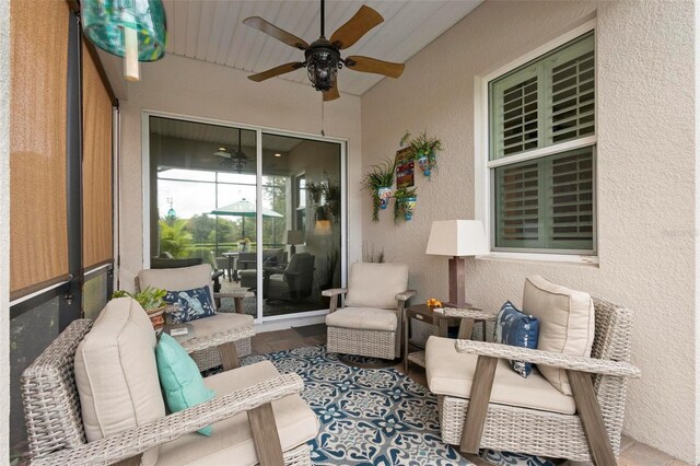 view of patio / terrace featuring ceiling fan