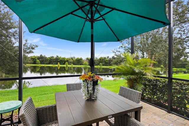 sunroom with a water view