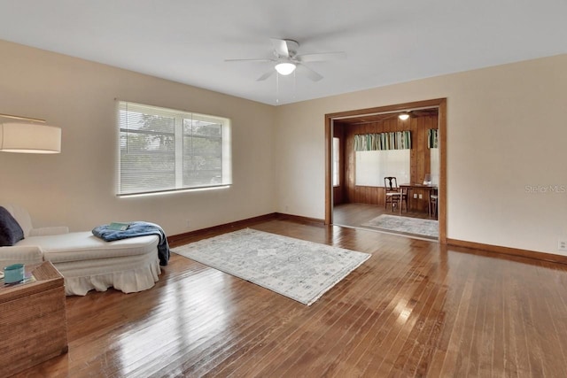 unfurnished room featuring ceiling fan and hardwood / wood-style floors