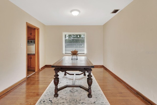 dining room with light hardwood / wood-style flooring