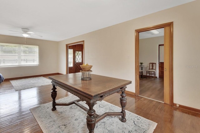 dining area featuring ceiling fan and hardwood / wood-style flooring