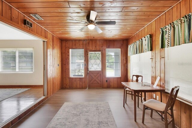 interior space featuring ceiling fan and wooden ceiling