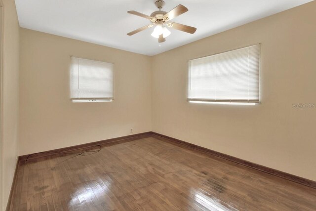 unfurnished room featuring wood-type flooring and ceiling fan