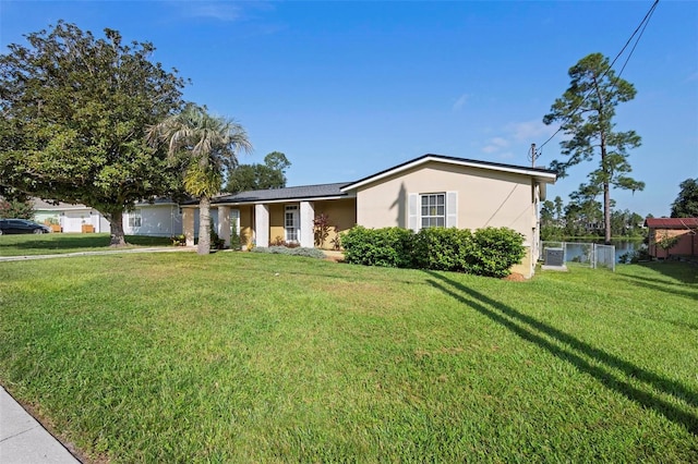 view of front of property with a front yard