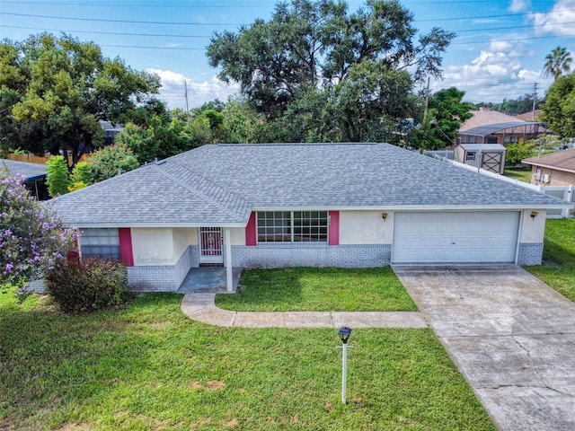 single story home with a garage and a front yard