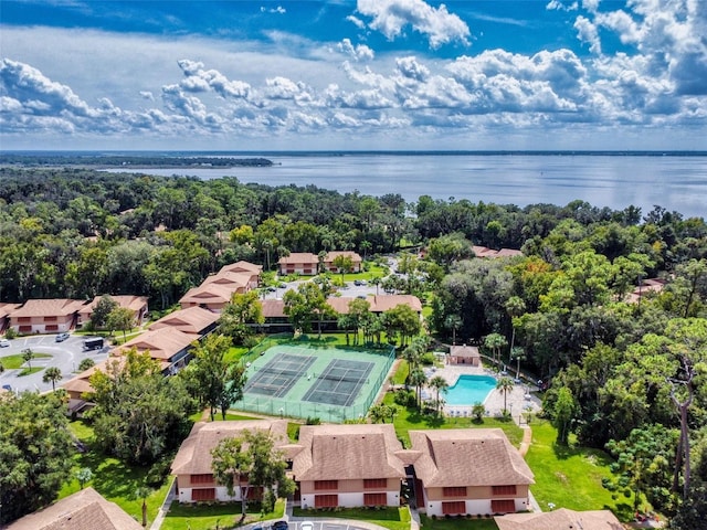 birds eye view of property featuring a water view