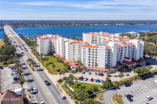 drone / aerial view featuring a water view