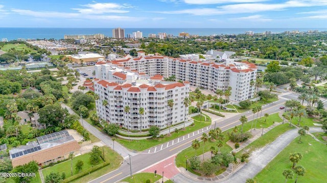 drone / aerial view with a water view