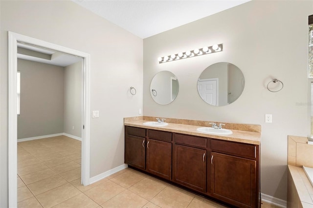 bathroom with vanity and tile patterned flooring