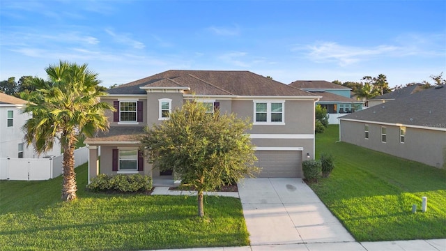 view of front of house with a garage and a front yard