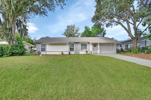 single story home with a garage and a front yard