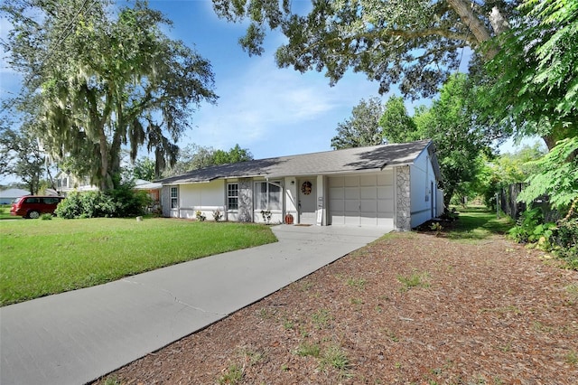 single story home with a garage and a front lawn