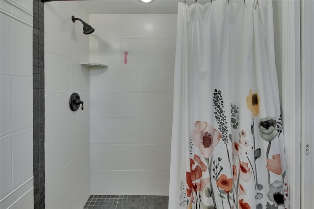 bathroom with a shower with curtain