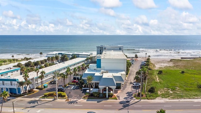 bird's eye view with a view of the beach and a water view