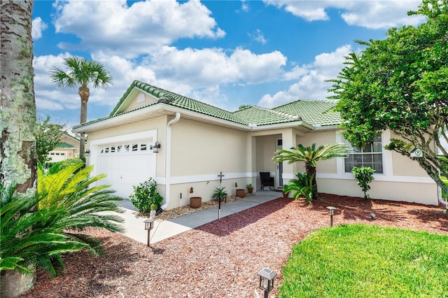 view of front of property featuring a garage