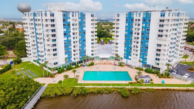 birds eye view of property with a water view