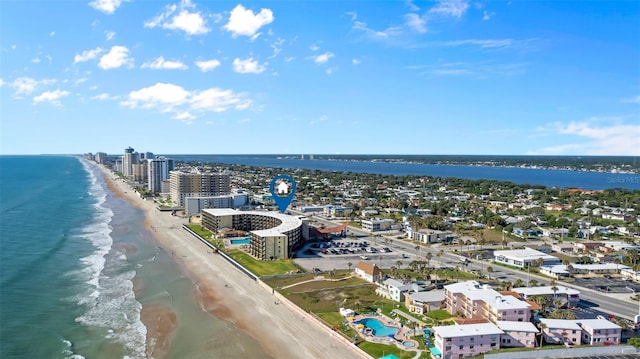 aerial view featuring a water view and a view of the beach