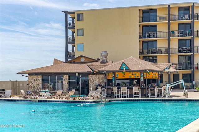 view of swimming pool featuring a gazebo and a patio area