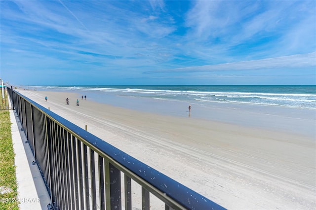 view of water feature with a beach view