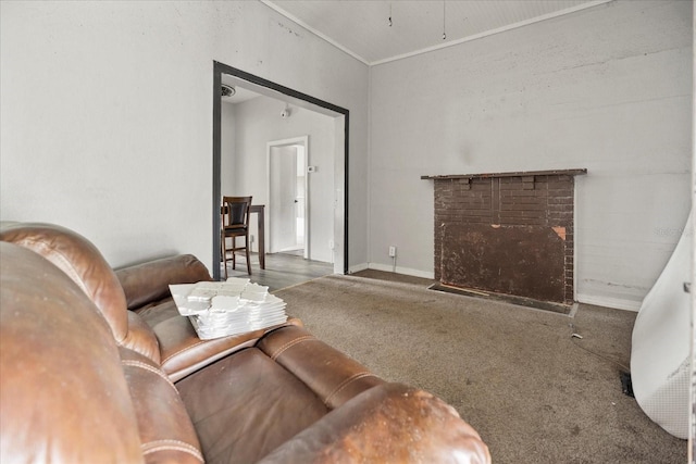 carpeted living room with a brick fireplace