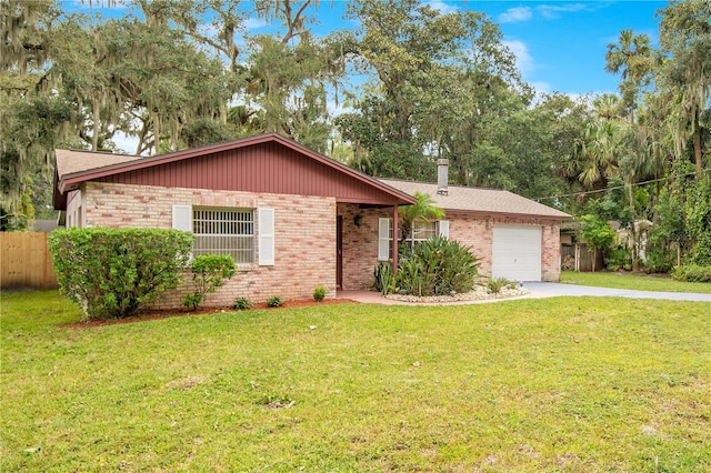 single story home with a garage and a front lawn