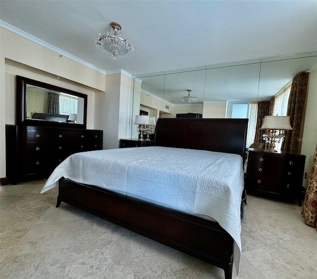 bedroom featuring crown molding