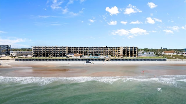 drone / aerial view with a view of the beach and a water view