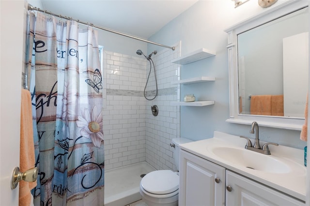 bathroom featuring vanity, toilet, and a shower with curtain