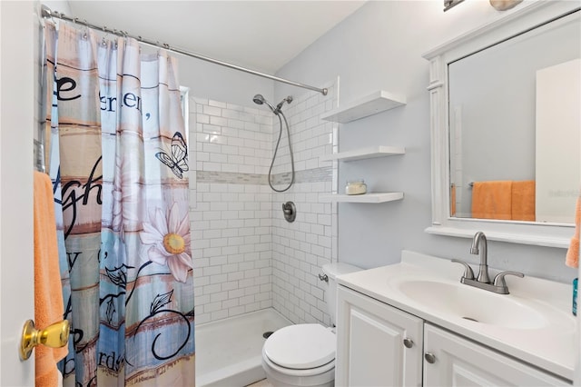 bathroom featuring toilet, vanity, and a shower with shower curtain