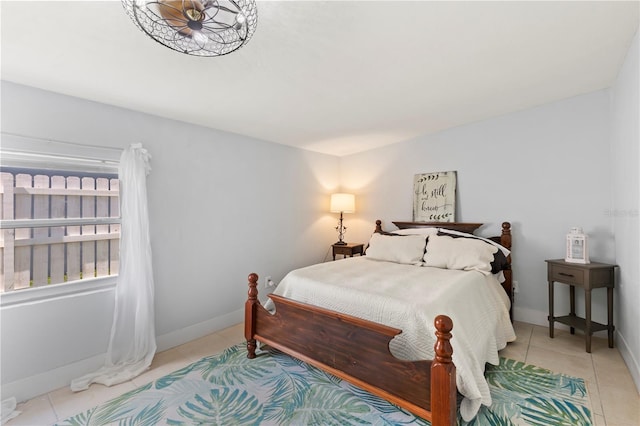 bedroom with light tile patterned floors