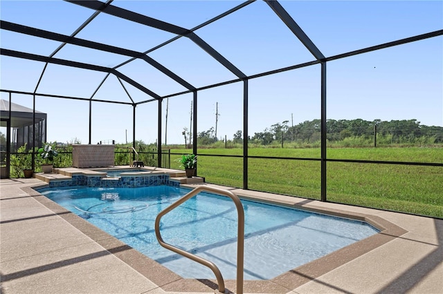 view of pool featuring glass enclosure, a yard, and an in ground hot tub