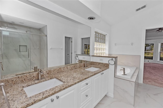 bathroom featuring vanity and plus walk in shower