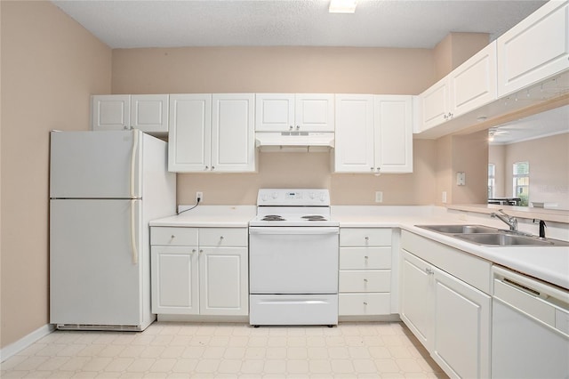 kitchen featuring white cabinets, a textured ceiling, sink, and white appliances