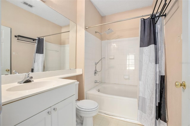 full bathroom featuring a textured ceiling, shower / tub combo, vanity, and toilet