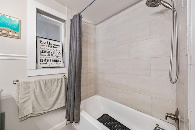 bathroom with shower / bath combo