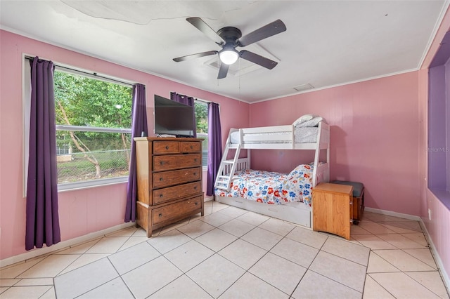 tiled bedroom featuring multiple windows, crown molding, and ceiling fan