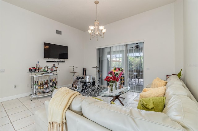 929 Hialeah St, Rockledge, FL 32955 - living area featuring baseboards, visible vents, a chandelier, and light tile patterned floors