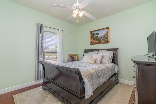 929 Hialeah St, Rockledge, FL 32955 - bedroom with light wood-type flooring, baseboards, and ceiling fan