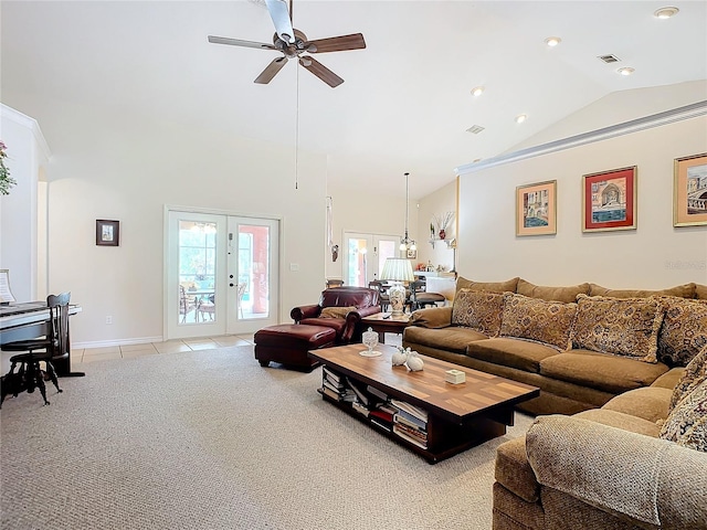 carpeted living room with french doors, vaulted ceiling, and ceiling fan