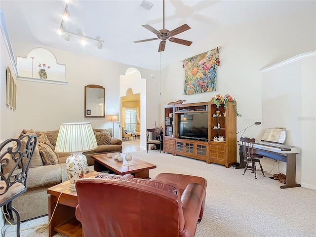 living room featuring light colored carpet and ceiling fan