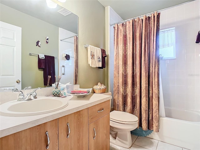 full bathroom featuring tile patterned flooring, vanity, toilet, and shower / bathtub combination with curtain