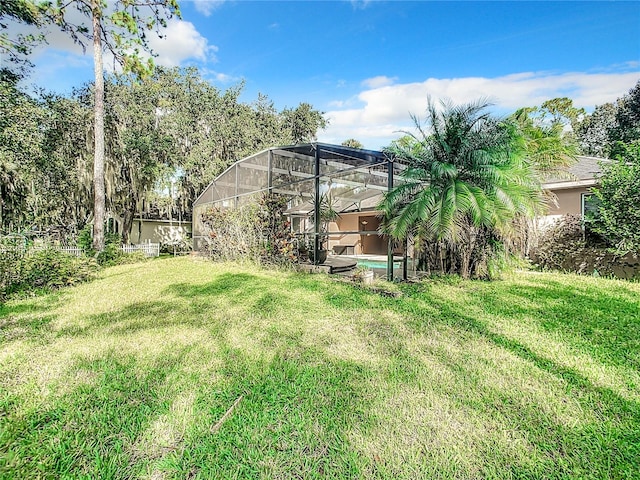 view of yard featuring a lanai