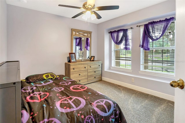 bedroom featuring ceiling fan and carpet floors