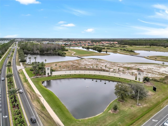 birds eye view of property featuring a water view