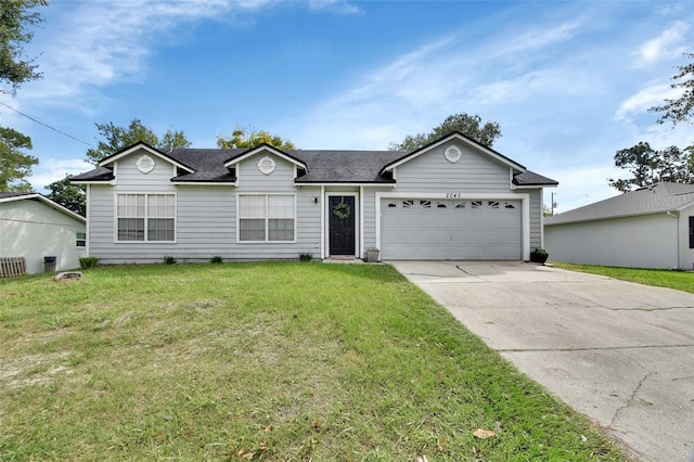 ranch-style house with a front yard and a garage