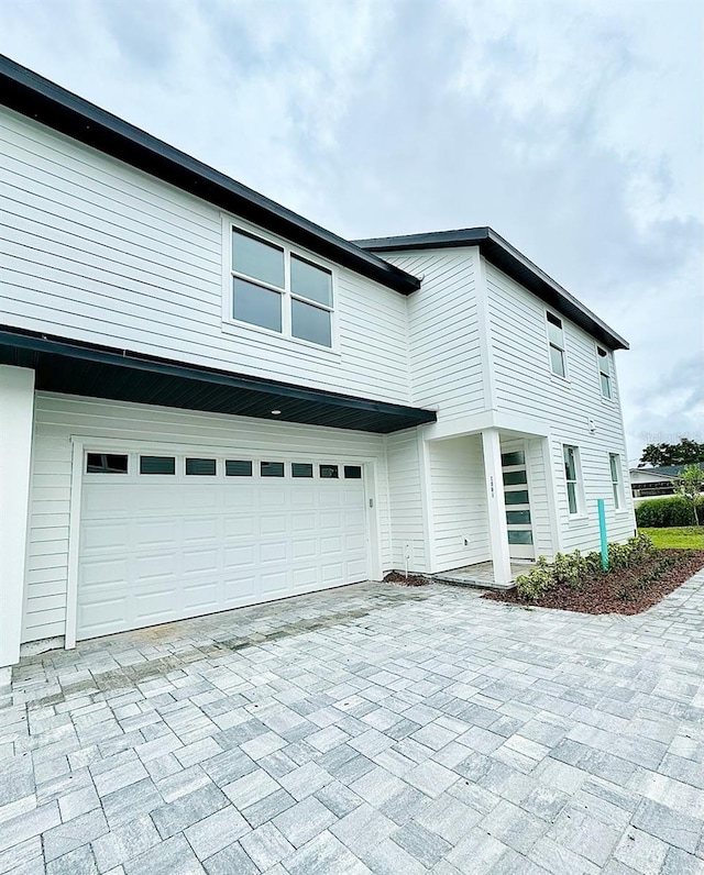 front of property featuring a garage