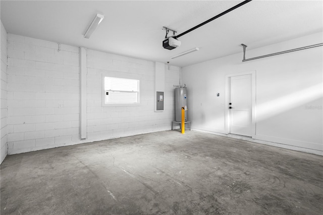 garage featuring electric panel, a garage door opener, and water heater