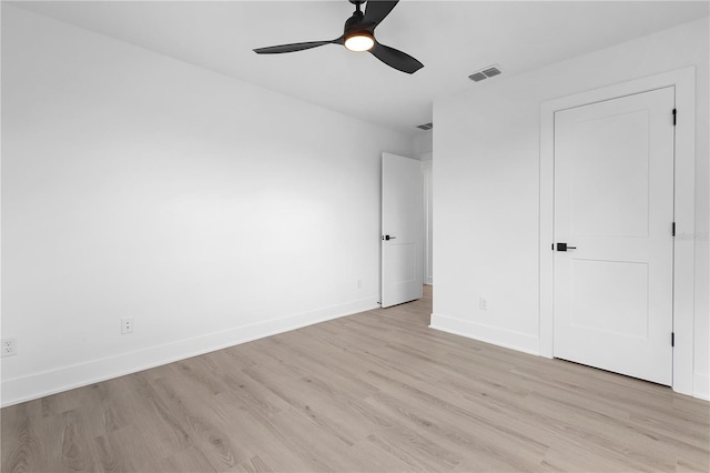 unfurnished bedroom featuring light hardwood / wood-style flooring and ceiling fan