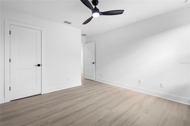 unfurnished bedroom featuring light hardwood / wood-style flooring and ceiling fan